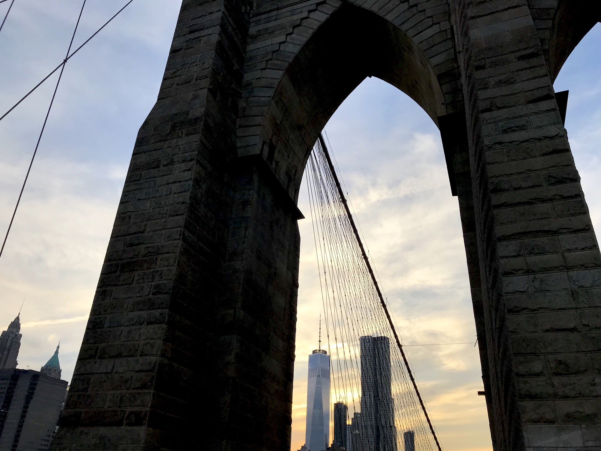 Photo of sunset over Brooklyn Bridge.